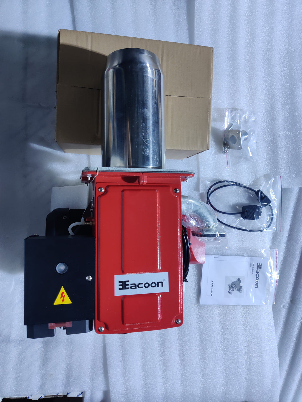 Arnik E-Gas-305PAB gas burner with control panel, showcasing industrial design and fuel connection for heating applications.